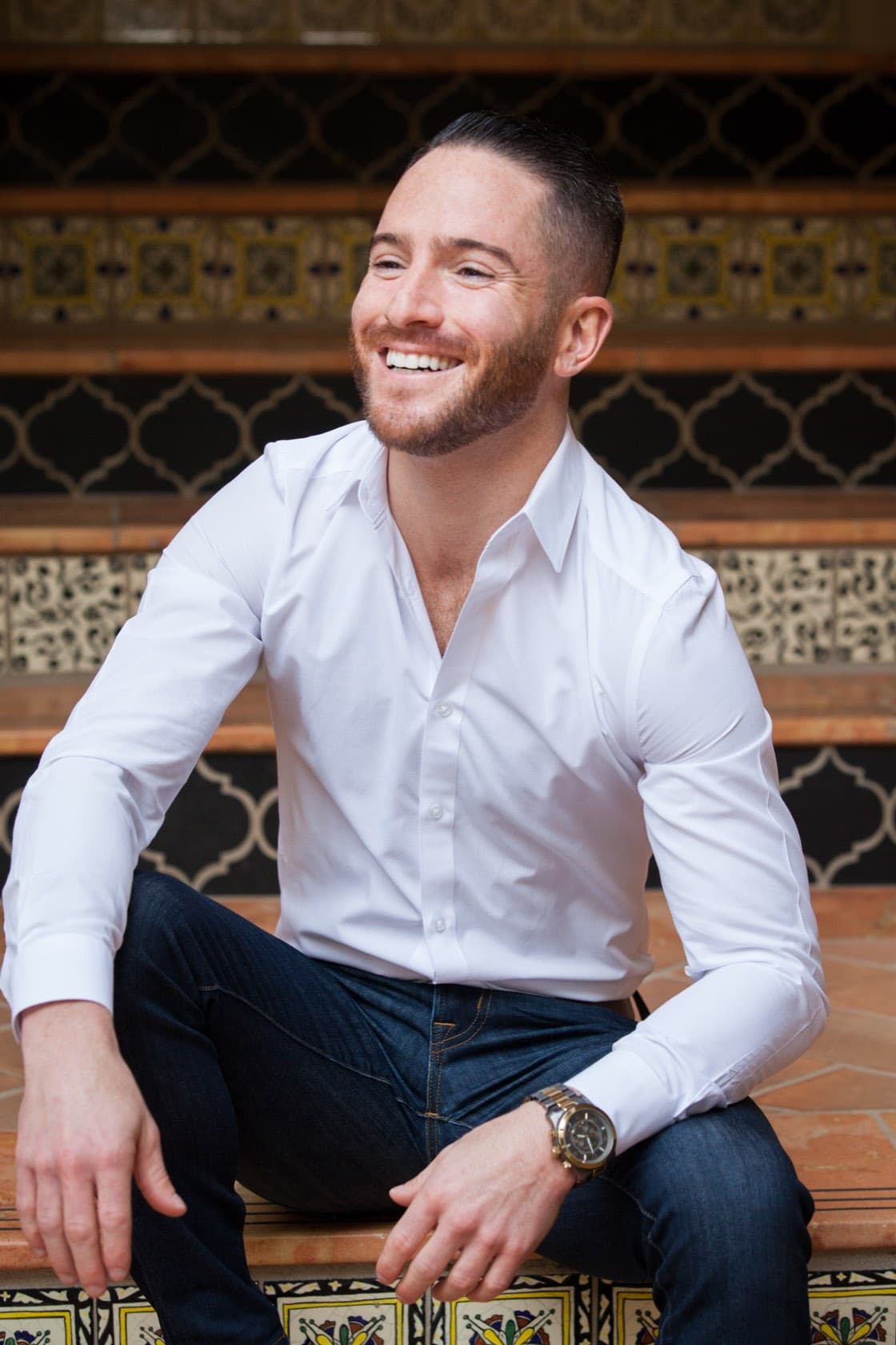 Dr. Ori Lidor sitting on tiled steps
